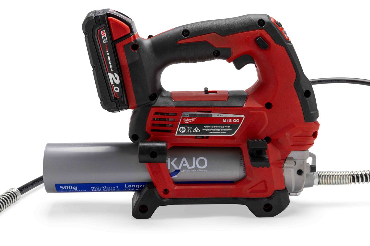 A high-performance KAJO LZR2 grease being applied using a professional grease gun for industrial equipment maintenance.