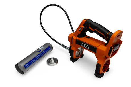Orange AEG grease gun with a black handle, flexible hose, and a 500g grease cartridge, placed on a white surface.