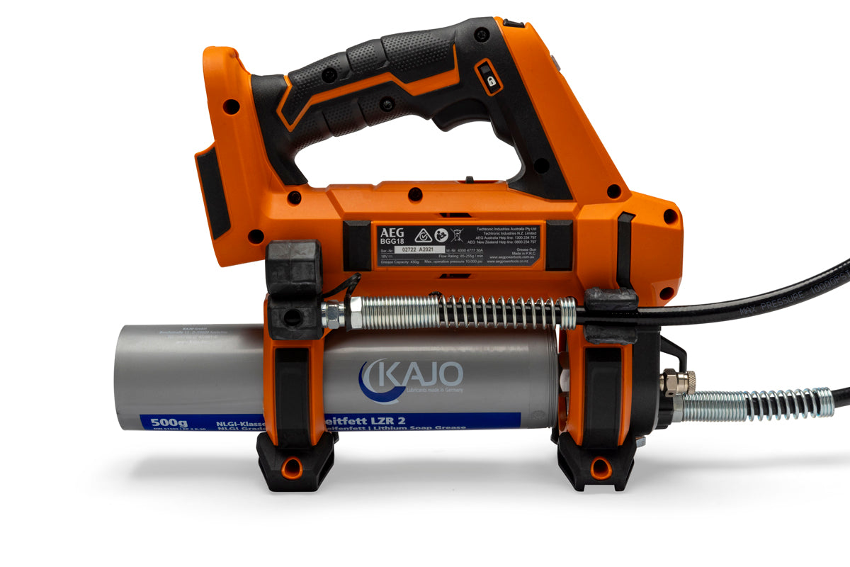 Orange cordless grease gun with black grip, metal grease cartridge, and flexible hose for high-pressure lubrication.